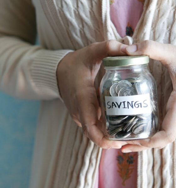Emergency fund in 2026 savings jar with cash for unexpected expenses