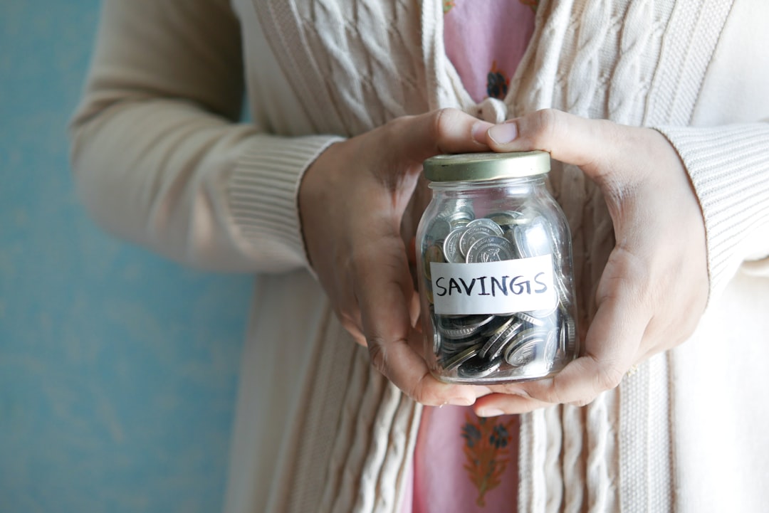 Emergency fund in 2026 savings jar with cash for unexpected expenses