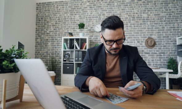 Young professional investing with first paycheck