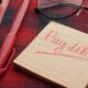 Pay off credit card debt fast — handwritten pay debt reminder note