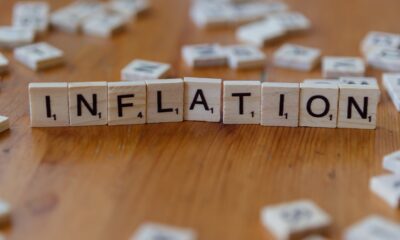 Protect savings from inflation concept with inflation spelled in letters