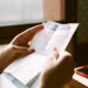 Person reviewing medical debt hospital bill paperwork in 2026