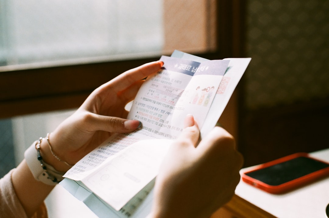 Person reviewing medical debt hospital bill paperwork in 2026