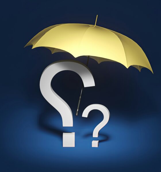 Umbrella with question mark representing the term vs whole life insurance decision
