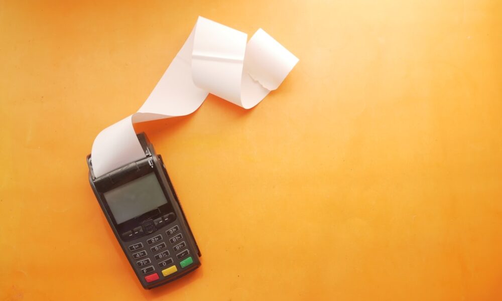What happens if you stop paying credit card debt — overdue bill and unpaid statement on a table