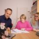 how much life insurance do you need in 2026 family reviewing coverage options